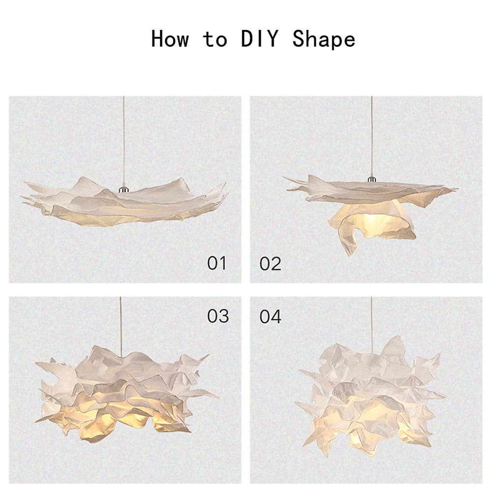 Wolkvormige hanglamp van papier met zachte sfeerverlichting in de slaapkamer