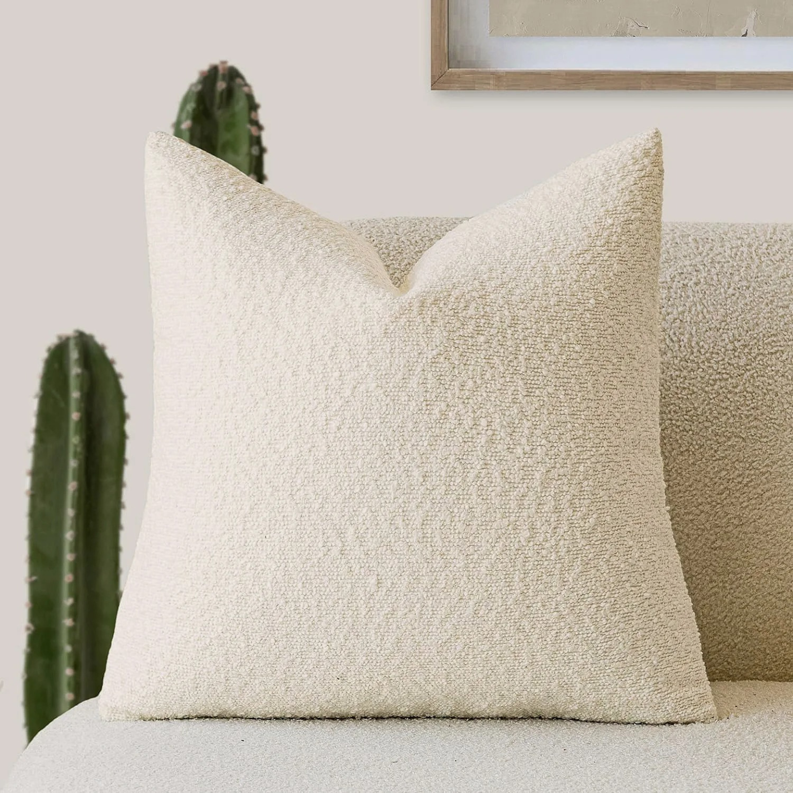 Detail van de bouclé stof van een polyester kussenhoes met lusjesstructuur