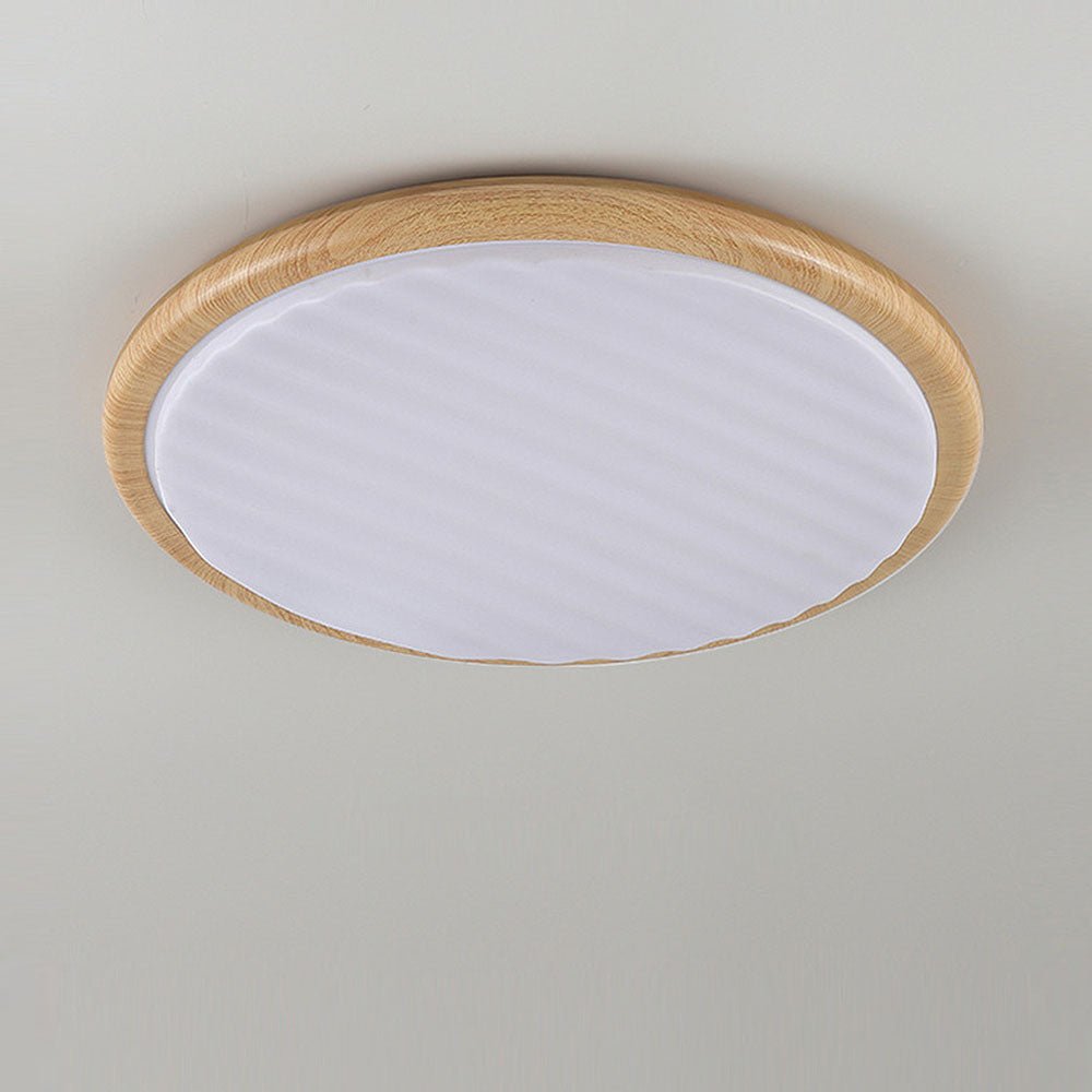 verleidelijke ronde houten led plafondlamp met een charmante plooi voor je slaapkamer