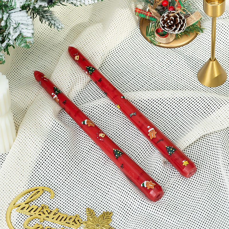 Decoratieve waskaarsen met kerstthema voor een warme kerstsfeer