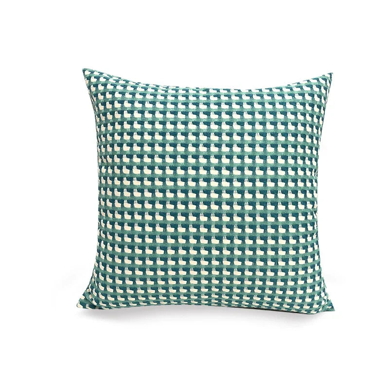 vierkante kussenhoes met modern geometrisch patroon in contrastkleuren
