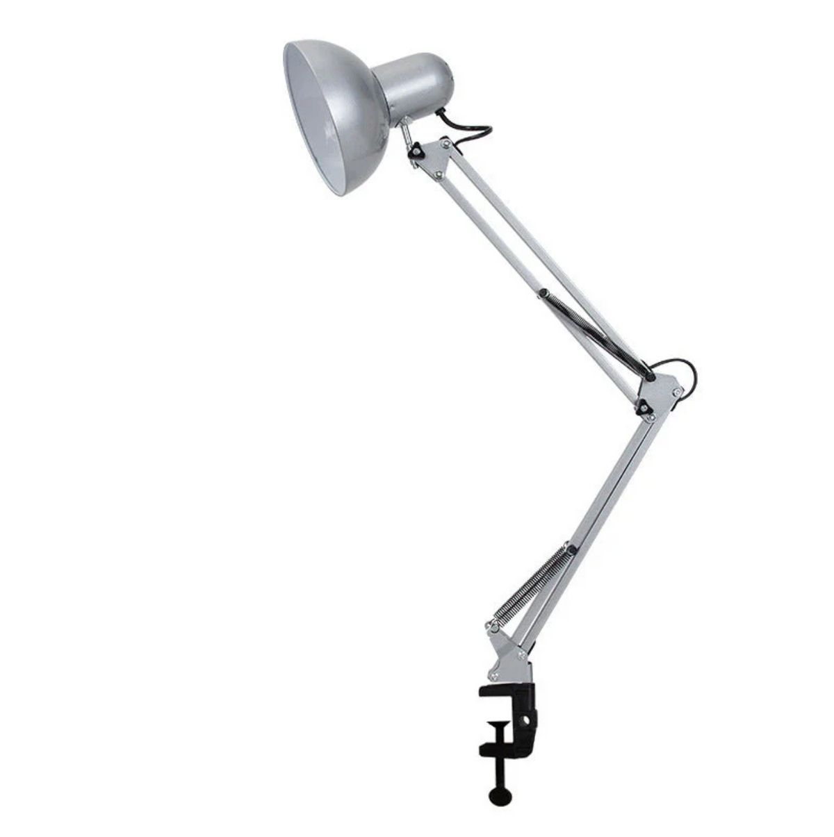 bureaulamp met klem naast een laptop op een bureau