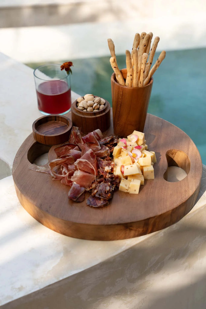 the teak root cutting board - m