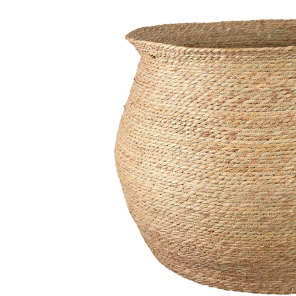 Translate "Korbin Brown seagrass round basket taps SV4" to Dutch.