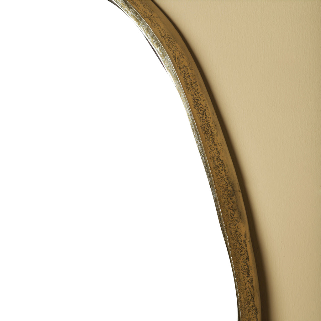 limera brass alu oval mirror with irregular edge.