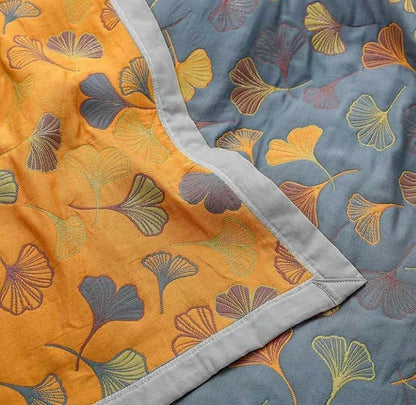 Machinewasbaar woonplaid met elegant ginkgobladmotief
