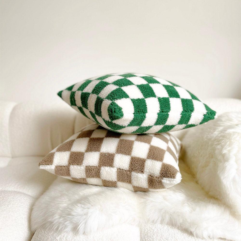 kussenhoes met schaakbordmotief in close-up van de stof en textuur